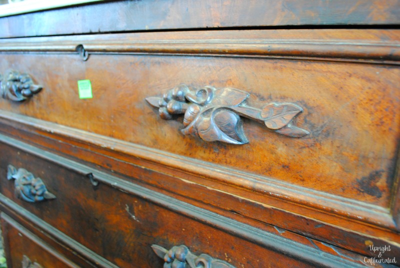 Find unique pieces of furniture or antiques at an auction.