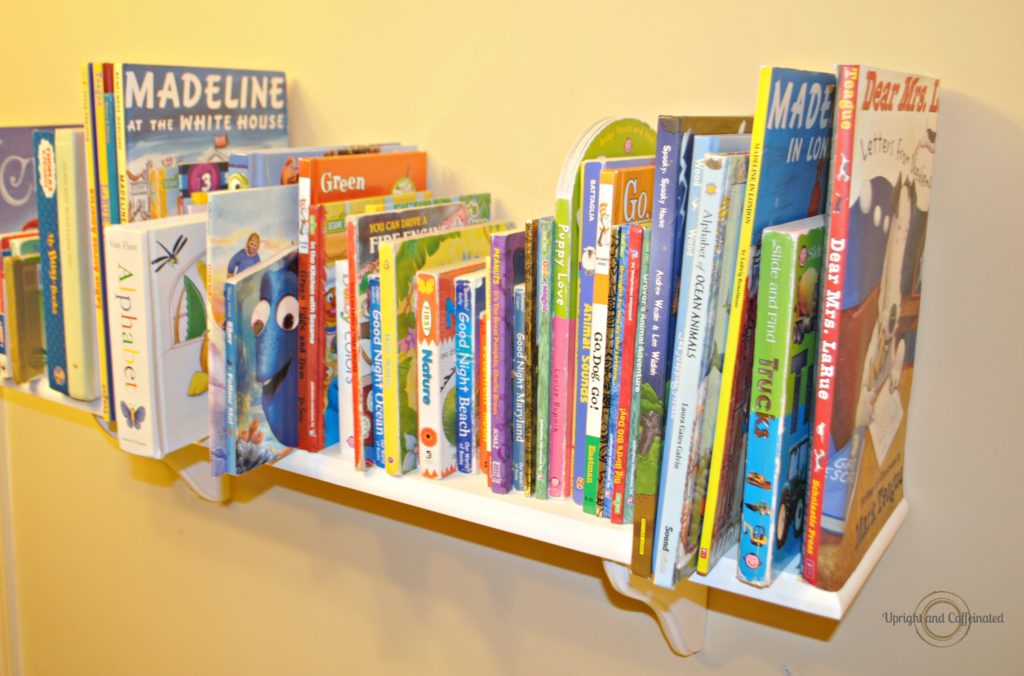 Simple Bookshelf with Creative DIY Bookends. What a brilliant way to use a cheap shelf for kids books! 