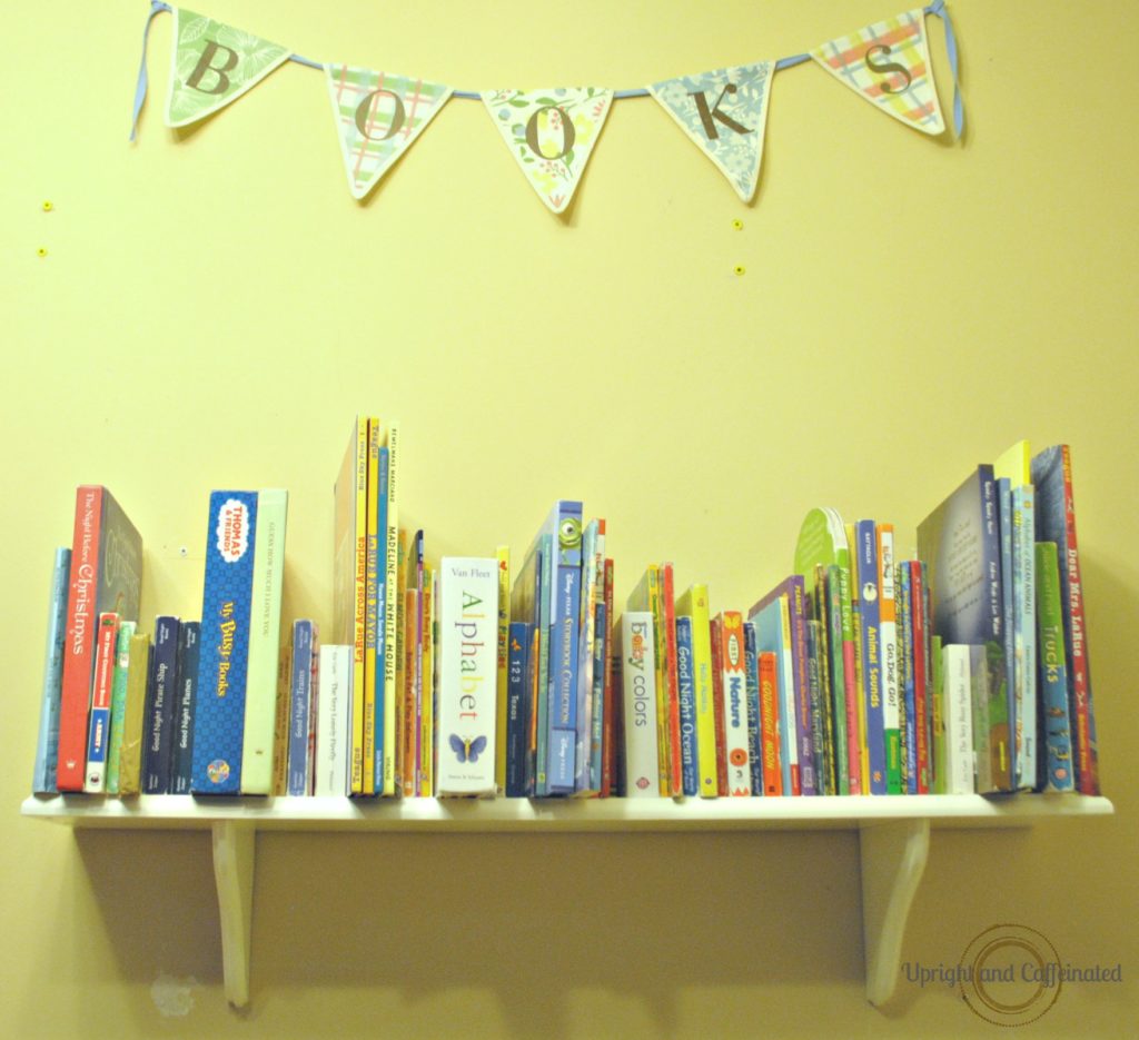 Simple Bookshelf with Creative DIY Bookends. What a brilliant way to use a cheap shelf for kids books! 