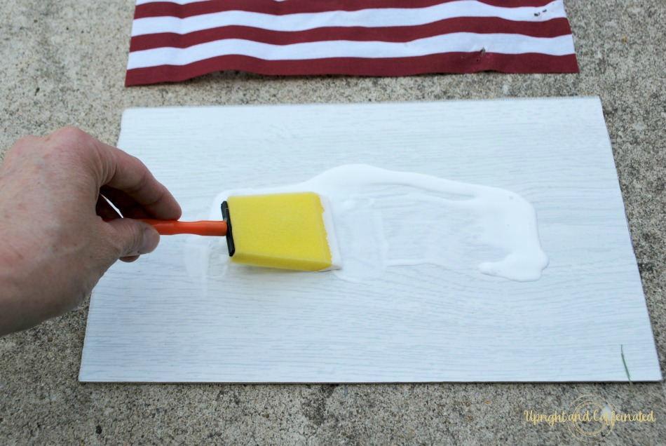 Mod Podge is a great adhesive to use to make a DIY patriotic American flag sign. 