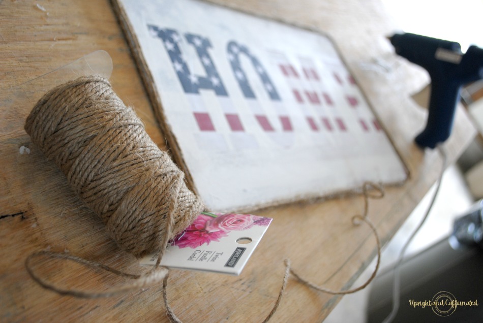 Hot glue twine around this flag sign to finish it off.