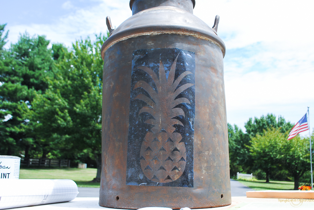 Easily update an old milk can to a pretty planter by adding a stencil. 