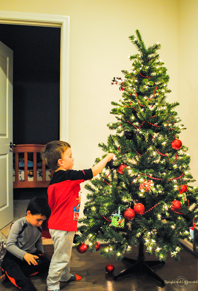 Kids can help with Christmas tree decorations too! 