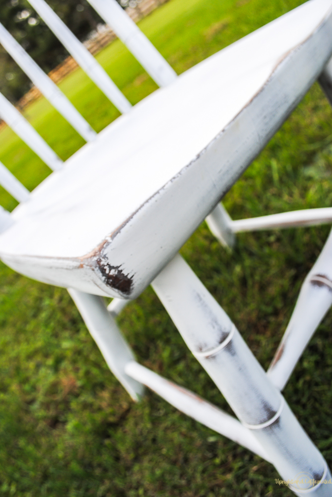 Spray paint furniture and then distress with a sanding sponge. 