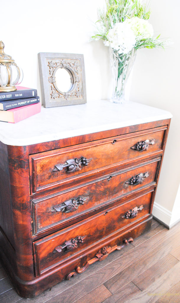 I almost told the builder to get rid of this niche. I am so glad we went ahead with the plans. Now I have a place for my antique dresser. 