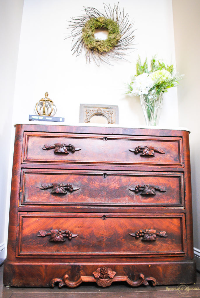 I love the way this antique dresser looks in our foyer. 