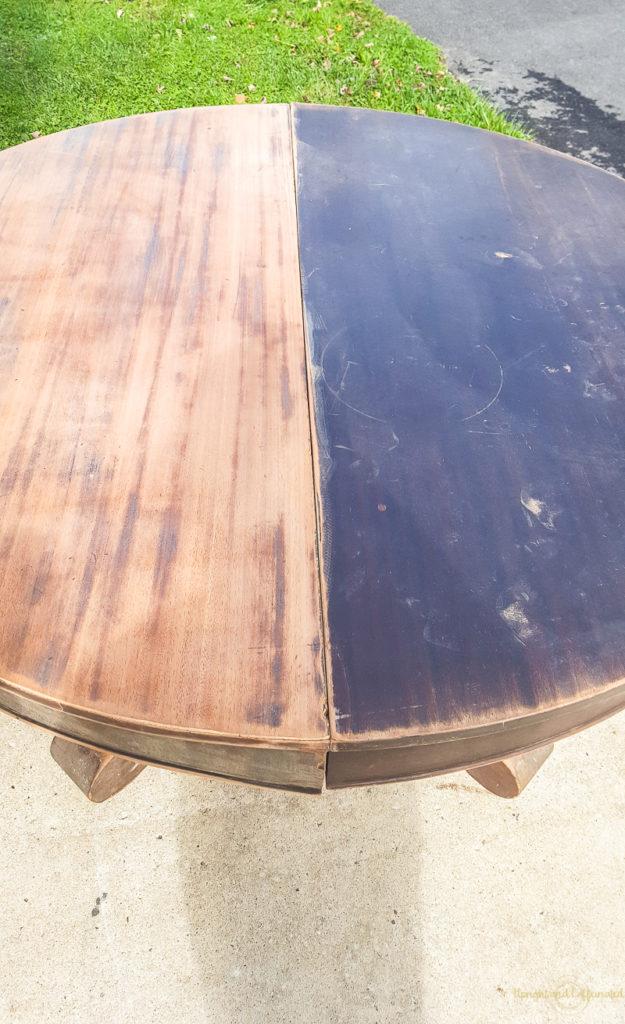 Half sanded and half with the old veneer on this round dining table. Wait until you see the finished table! 