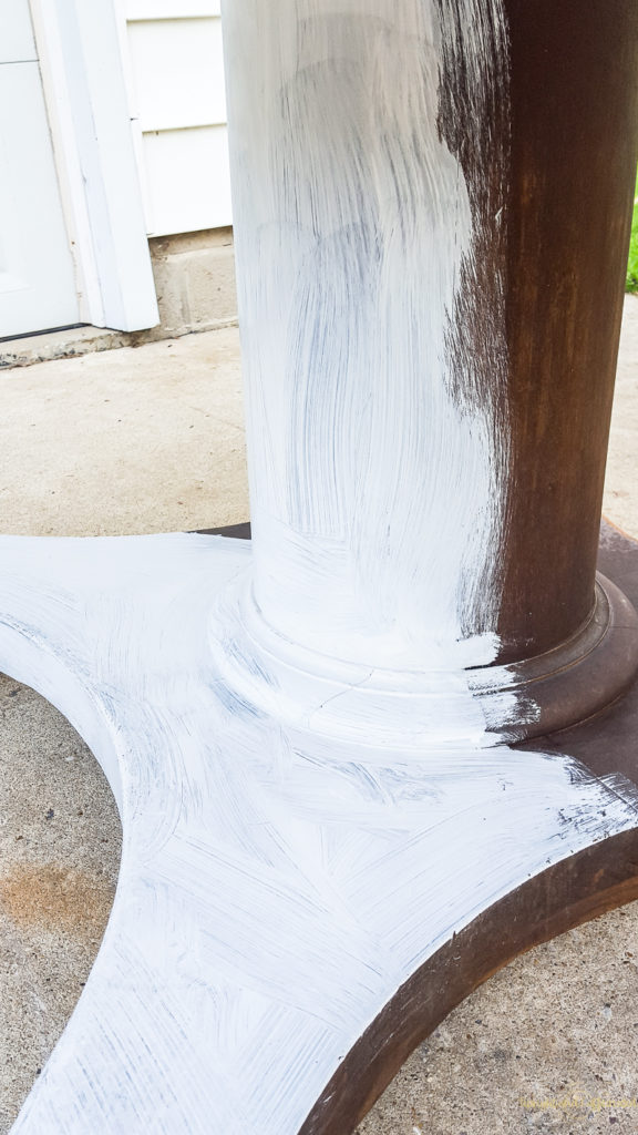 I painted the pedestal of this round dining table with white chalk paint. 