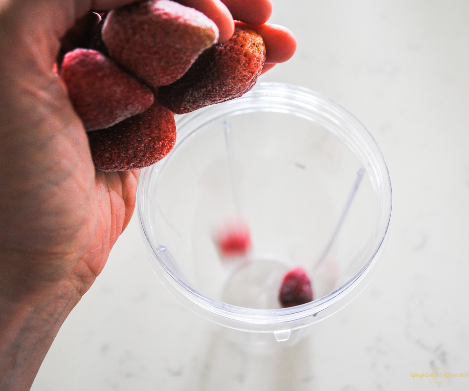 Frozen strawberries go in this rum cocktail. 