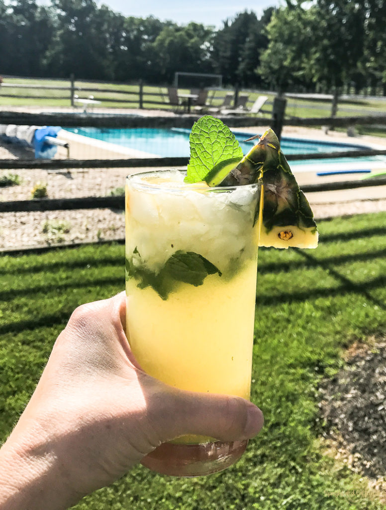 Grilled pineapple mojitos pool-side is the best! Click for the full mojito recipe. 