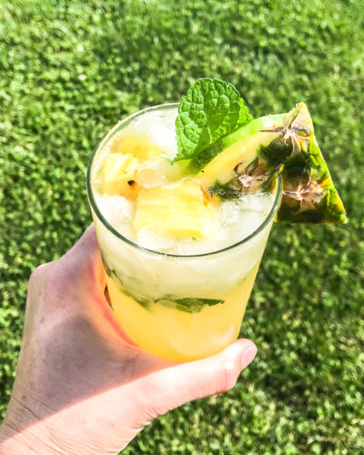 I love flavored mojito recipes. This grilled pineapple mojito doesn't disappoint!