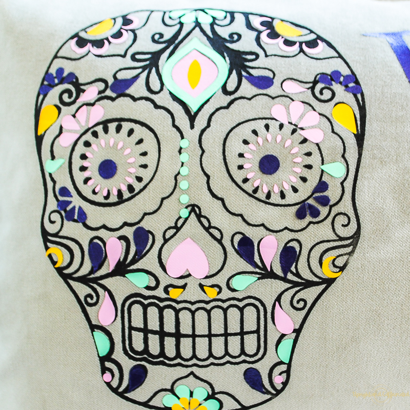 These Coco-inspired pillows are amazing. This tutorial will teach you how to layer HTV Vinyl like a pro! 